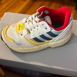 Adidas Children’s Shoes Torsion in Red/Green/Yellow color wave